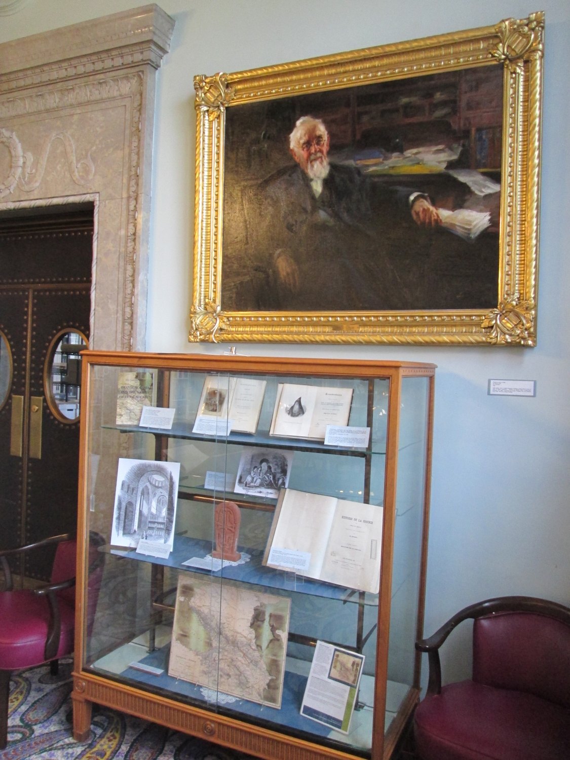 Display with portrait of John G. White I